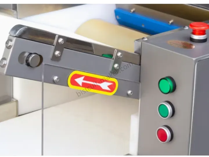 Dough sheeter control panel with safety guard and direction indicator