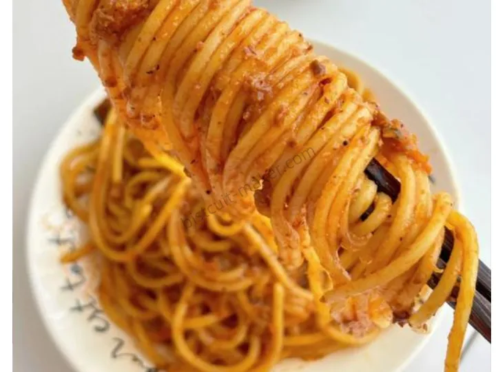 Fresh pasta dough sheet rolled thin and even by pasta dough sheeter machine