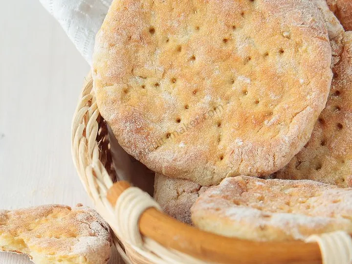Soft pita bread with perfect round shape and fluffy texture rolled by dough sheeter